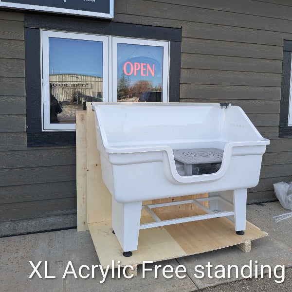 White XL Acrylic free-standing sink in front of a building with 'CGD' signage.