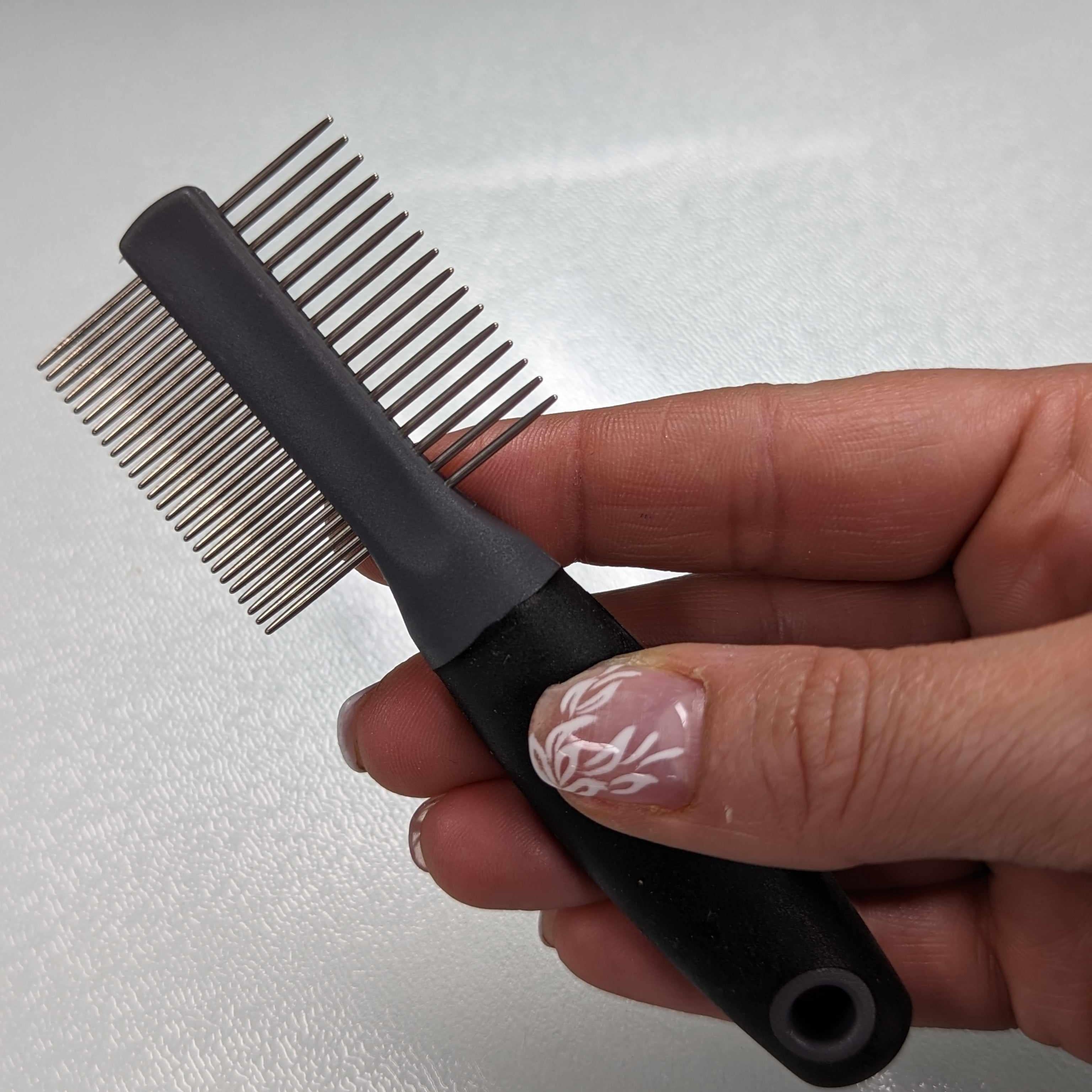 Tiny double sided comb