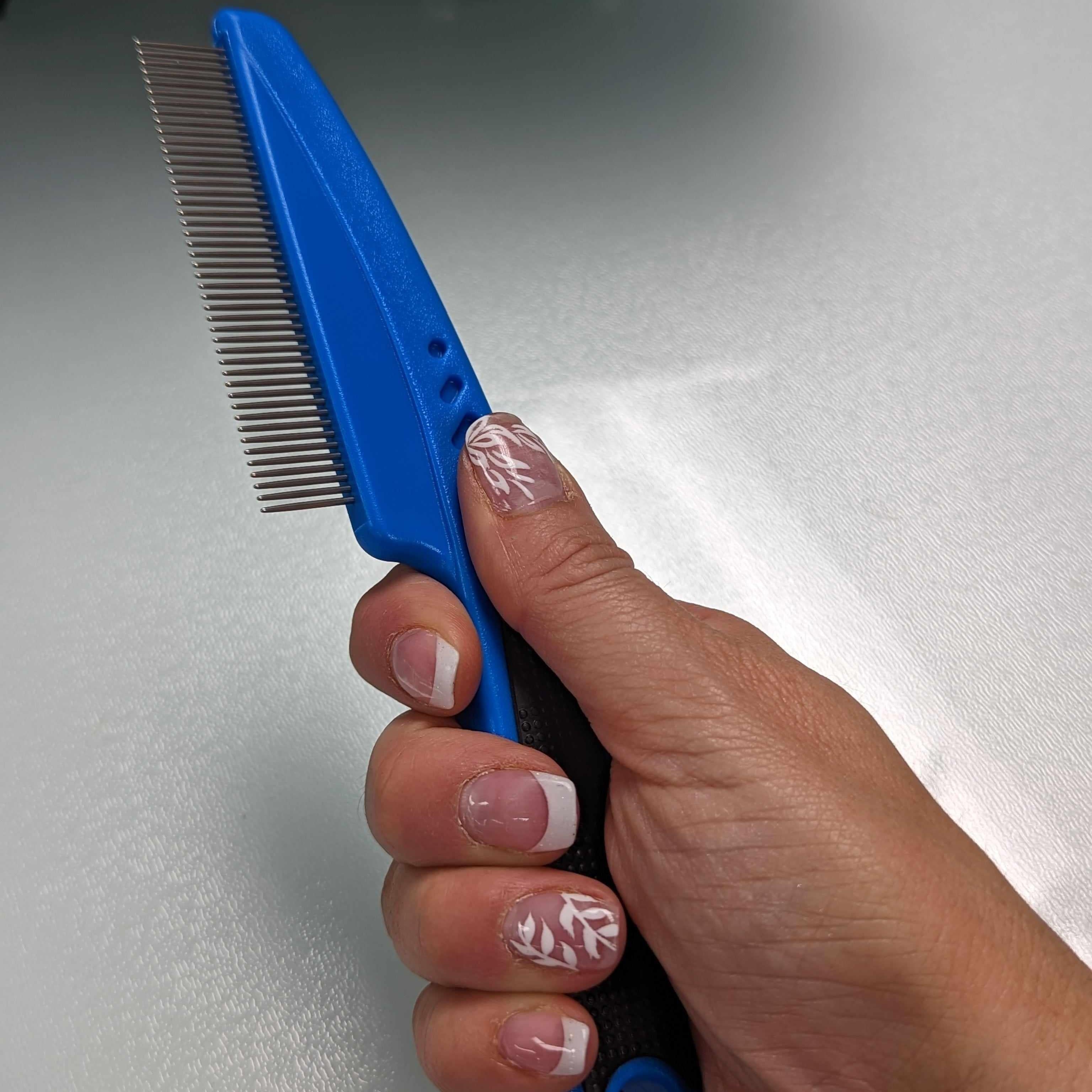 Plastic grip Flea & Face comb