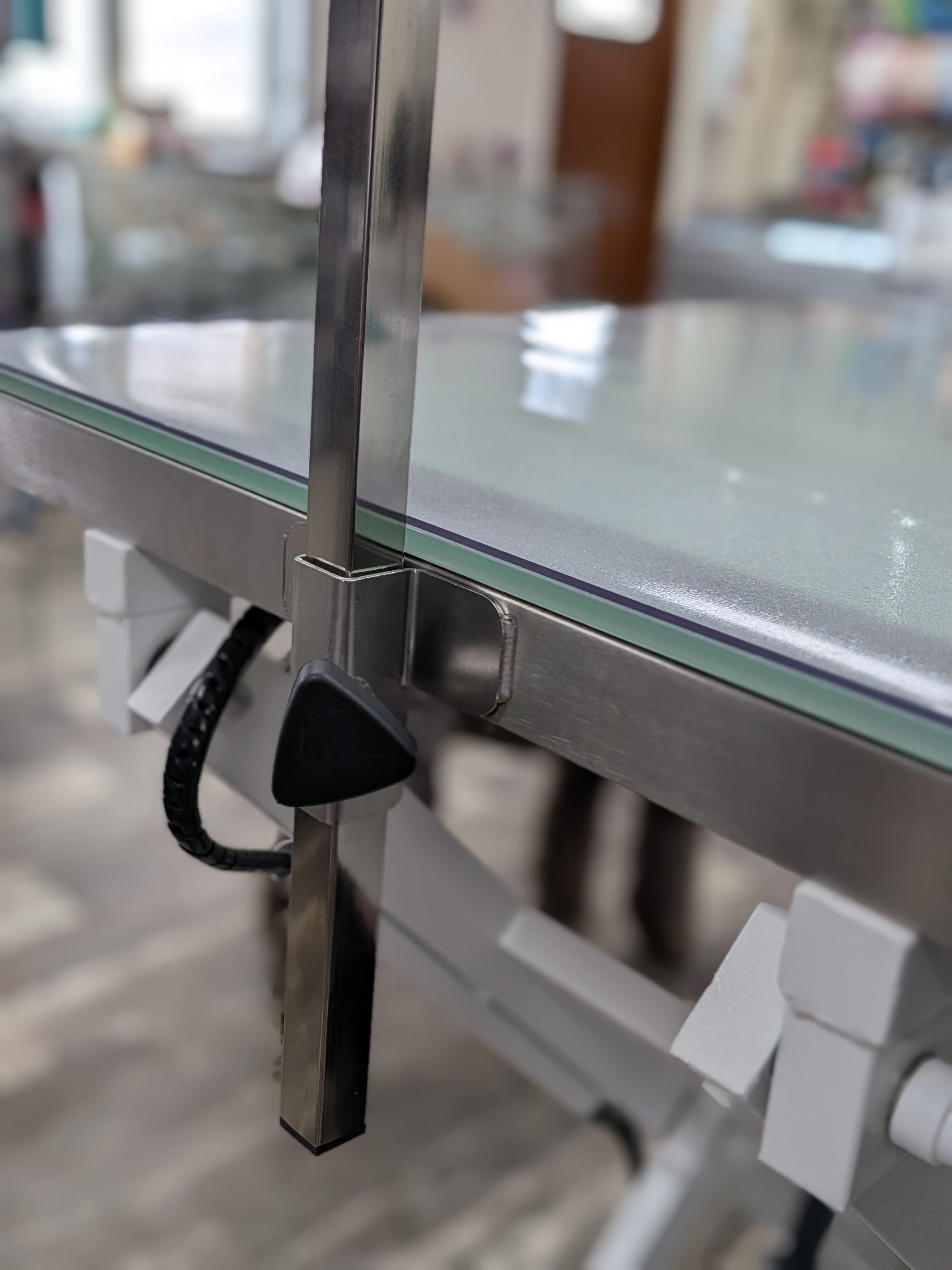 Bras de toilettage repose-menton et fesses